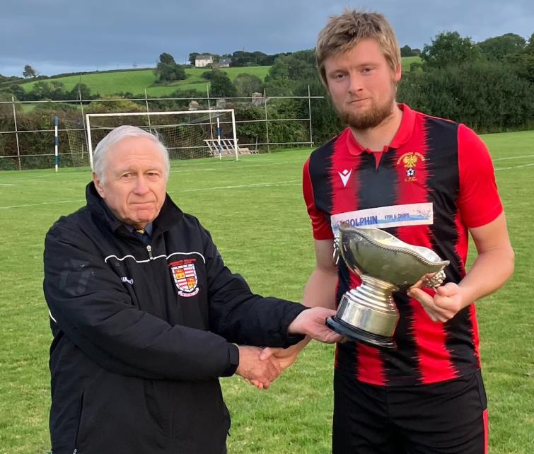 Mike John presents Jubilee Cup to Goodwick skipper Scott Delaney